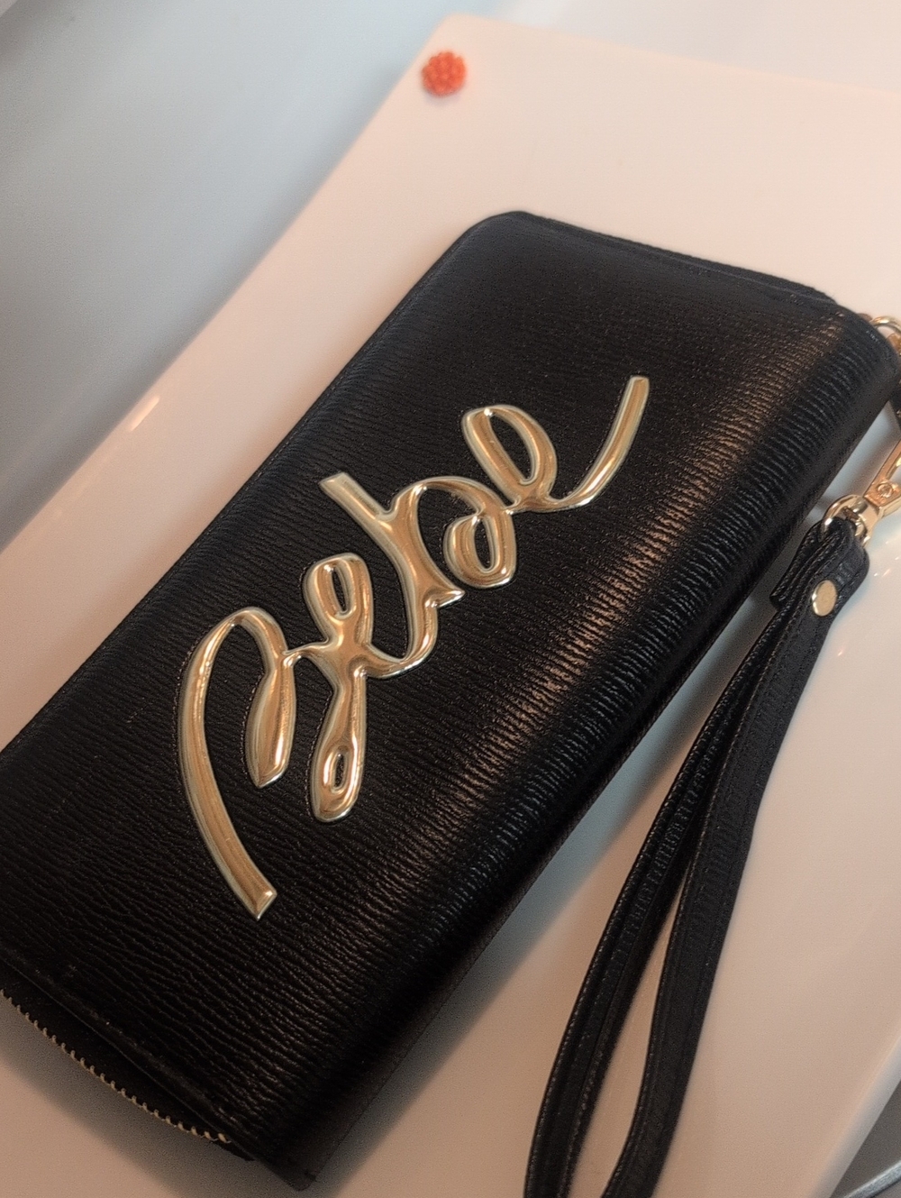 Bebe Black Women's Wristlet Wallet with Gold Script Accent